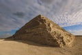 Majestic View to the Step Pyramid of Djoser under blue sky, is an archaeological site in the Saqqara necropolis, northwest of the Royalty Free Stock Photo