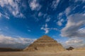 Majestic View to the Step Pyramid of Djoser under blue sky, is an archaeological site in the Saqqara necropolis, northwest of the Royalty Free Stock Photo