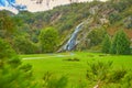 Majestic water cascade of Powerscourt Waterfall, the highest waterfall in Ireland. Famous tourist attractions in co. Wicklow, Irel