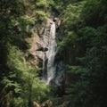 Majestic Waterfall in Lush Green Surroundings