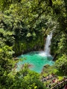 Majestic waterfall in the rainforest jungle of Costa Rica. Tropical hike