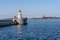 Majestic white lighthouse situated in Malmo, Sweden overlooking the crystal blue sea