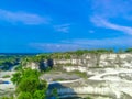 The majestic white limestone cliffs of Bukit Kapur Jaddih in Madura, Indonesia Royalty Free Stock Photo