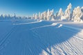 Alpine ski resort. Cross-country skiing track or trail. Sunny day. Christmas time. Happy new year celebration. Royalty Free Stock Photo