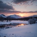 Majestic Winter landscape image looking towards Scottish Highlands mountain range across Loch Ba on Rannoch Moor made Royalty Free Stock Photo