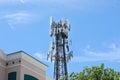 Cell Phone Tower on Top of a Building Royalty Free Stock Photo