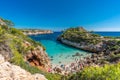People enjoying sun at Es calo des Moro beach Clasified as one of the best beaches in the world. Royalty Free Stock Photo
