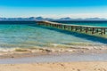 Majorca, wooden pier at the beach of bay of Alcudia, Spain Balearic Islands Royalty Free Stock Photo