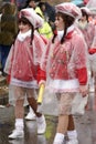 majorettes under clear plastic wrapping at Carnival parade, Stuttgart