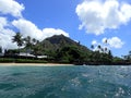 Makalei Beach with waves with Diamond Head crater in the distance Royalty Free Stock Photo