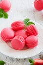 Makarons - with strawberry cream. Royalty Free Stock Photo