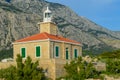 Lighthouse on Makarska riviera beach in Makarska, Croatia on June 17, 2019.