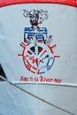 Logo of captain at docked ship in marina in Makarska