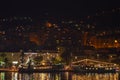 Panoramic night view of Makarska city center from the sea in Makarska, Croatia on June 16, 2019.