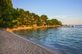 Makarska, Croatia: Tourists on Croatian resort Makarska sea beach