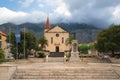 The main square in Makarska and church of St. Mark, Biokovo mountains, Croatia Royalty Free Stock Photo