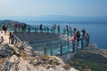 Tourists enjoy views on Biokovo skywalk, Makarska riviera panorama, Dalmatia, Croatia