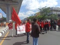 Makassar, Indonesia-11 April 2022- Demonstrators demanding stability in staple food prices and rejecting an 11% tax increase