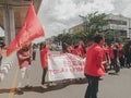 Makassar, Indonesia-11 April 2022- Demonstrators demanding stability in staple food prices and rejecting an 11% tax increase