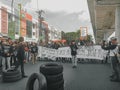 Makassar, Indonesia-11 April 2022- Demonstrators demanding stability in staple food prices and rejecting an 11% tax increase