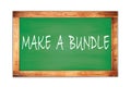 MAKE A BUNDLE text written on green school board