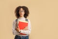 Make choices or think about study, problems at education. Pensive african american woman student in glasses with