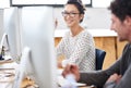 Make creativity a job. a young office worker sitting at her workstation in an office. Royalty Free Stock Photo