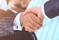 Make a deal. Handshake shot from low angle against the background of the business center Royalty Free Stock Photo