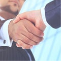 Make a deal. Handshake shot from  low angle against the background of the business center Royalty Free Stock Photo