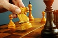 Make decisions and challenge. Chess player makes a move