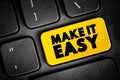 Make It Easy text button on keyboard, concept background Royalty Free Stock Photo