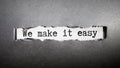 We make it easy text concept isolated over grey background, business concept. Royalty Free Stock Photo