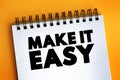 Make It Easy text on notepad, concept background Royalty Free Stock Photo