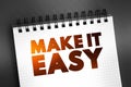 Make It Easy text on notepad, concept background Royalty Free Stock Photo