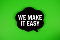 We Make It Easy text with speech bubble on green background Royalty Free Stock Photo