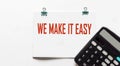 We make it easy, the text is written on a notepad Royalty Free Stock Photo