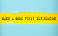 Make a good first impression text on the torn paper , yellow background Royalty Free Stock Photo