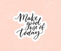 Make good use of today. Inspirational quote, brush calligraphy on pastel pink background