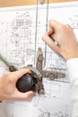 Make hands making a project on blueprint Royalty Free Stock Photo