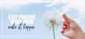 Stay positive, work hard, make it Happen. Hand holding Dandelion flower pointing to blue sky, close up photography, banner design