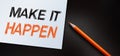 Make It Happen written with orange pencil. Used in business, life and sports coaching well known phrase for getting things done Royalty Free Stock Photo