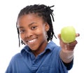 Make the healthy choice. A young AfricanAmerican boy holding an apple. Royalty Free Stock Photo