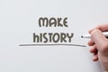 Make history written on whiteboard Royalty Free Stock Photo