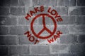 Make love not war graffiti on the wall Royalty Free Stock Photo