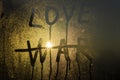 Make love not war, words on the glass Royalty Free Stock Photo