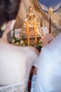 Make merit in the buddhist ceremony in Thai Traditional Wedding Royalty Free Stock Photo