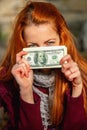 Make Millions By Loaning Money. Business woman giving you loan dollars for profit. Vertical image