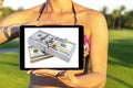 Make money online. Business concept with making profit using internet. Laptop computer with money in woman hands. Making money onl Royalty Free Stock Photo