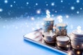 Make money online,  business e- commerce concept with stack of coin on mobile phone Royalty Free Stock Photo