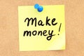 Make money! Text on a sticky note pinned to a corkboard. 3D rend Royalty Free Stock Photo